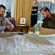 Illustration for article titled ‘They Can’t Impeach Someone They Can’t See,’ Say Trump Boys Cramming Dad Into Homemade Bunker Under Oval Office Desk